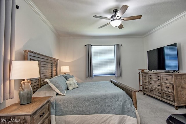 bedroom featuring ceiling fan, light colored carpet, and crown molding