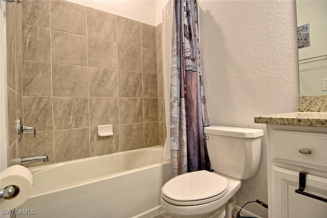 full bathroom featuring shower / bath combo with shower curtain, vanity, and toilet