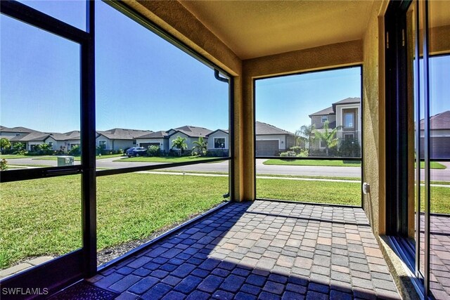 unfurnished sunroom with a healthy amount of sunlight