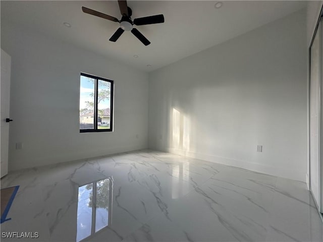 unfurnished room featuring ceiling fan