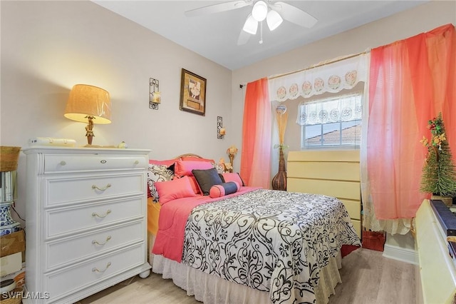 bedroom featuring ceiling fan and light wood-type flooring