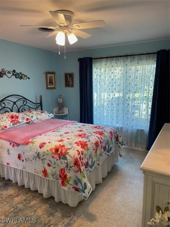 bedroom featuring ceiling fan