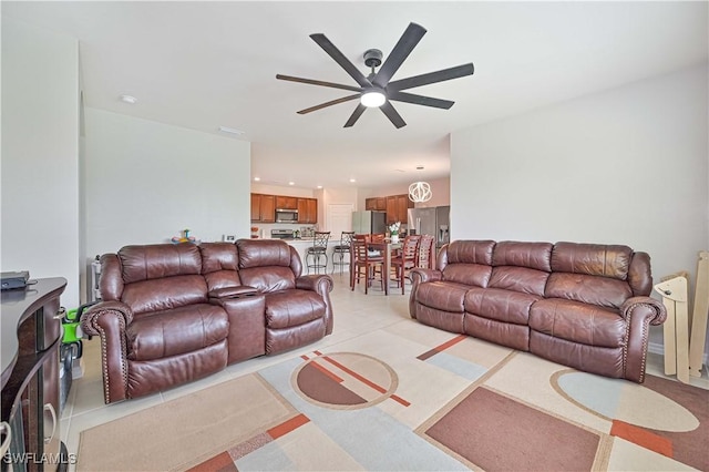 living room with ceiling fan