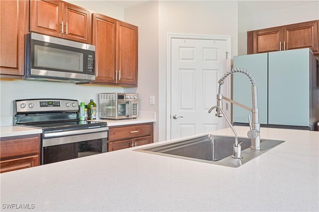 kitchen with stainless steel appliances and sink