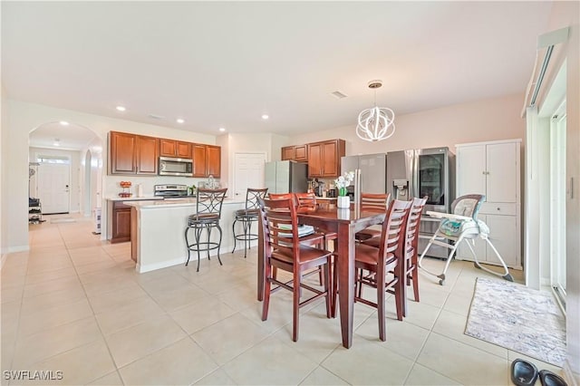 dining area featuring light tile patterned floors