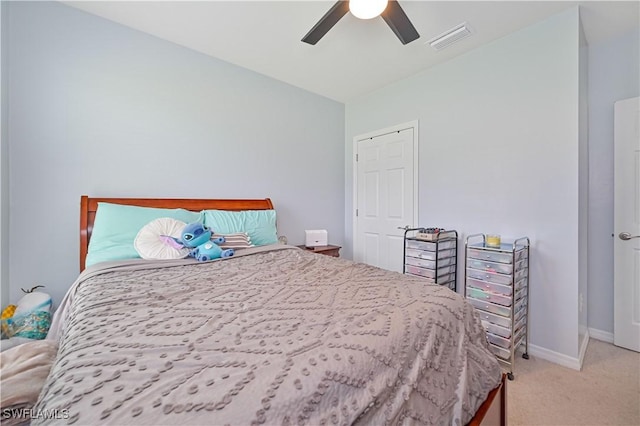 carpeted bedroom featuring ceiling fan