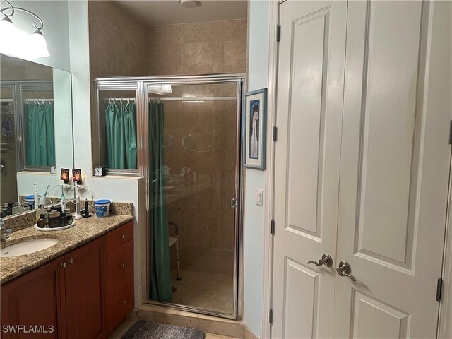 2825 Palm Beach Blvd Unit 118, Fort Myers, FL 33916 - bathroom with vanity and a stall shower