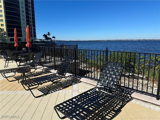2825 Palm Beach Blvd Unit 118, Fort Myers, FL 33916 - view of patio with a water view