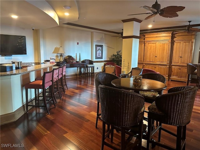 dining space with dark wood-type flooring