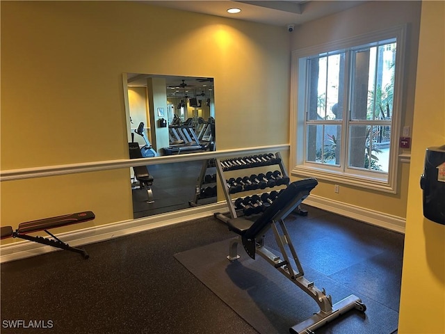 exercise room featuring ceiling fan