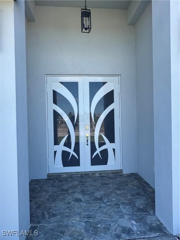 entrance to property with french doors