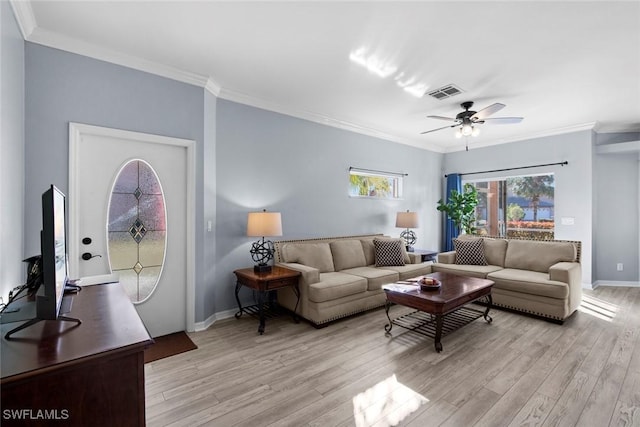 living room with ceiling fan, light hardwood / wood-style floors, and ornamental molding