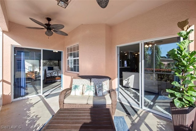 balcony featuring a patio and ceiling fan