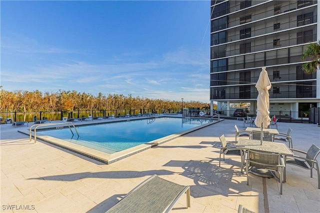 view of pool featuring a patio area