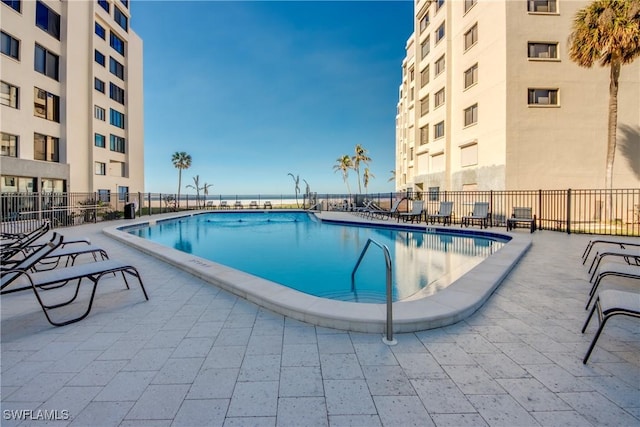 view of pool featuring a patio