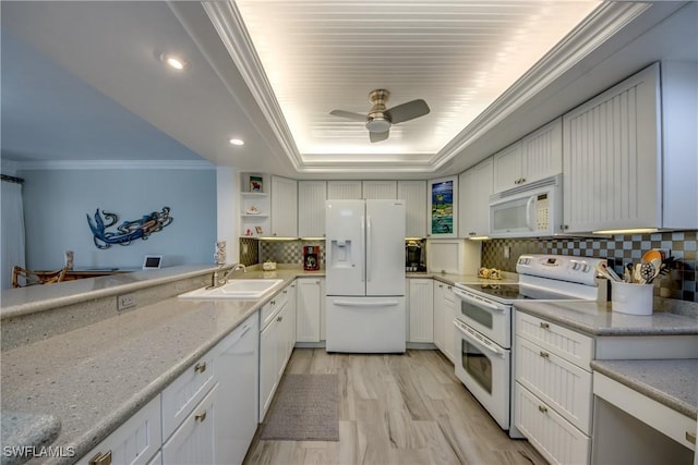 kitchen featuring white cabinets, white appliances, crown molding, and sink