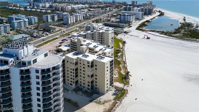 aerial view featuring a water view and a view of the beach