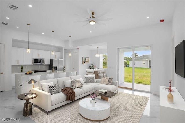 living room featuring ceiling fan