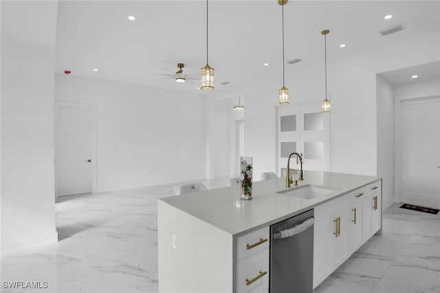 kitchen featuring white cabinets, decorative light fixtures, stainless steel dishwasher, and sink