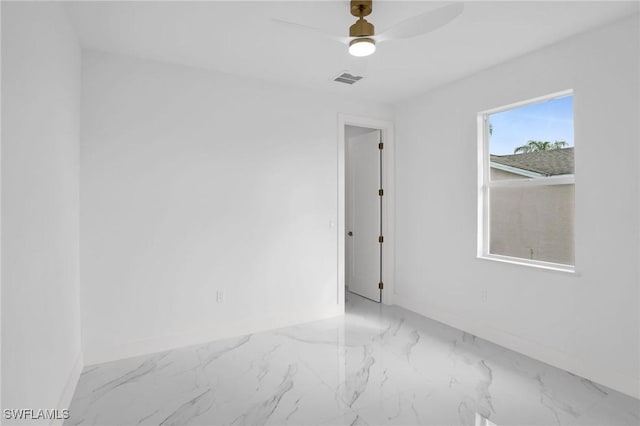 empty room featuring ceiling fan