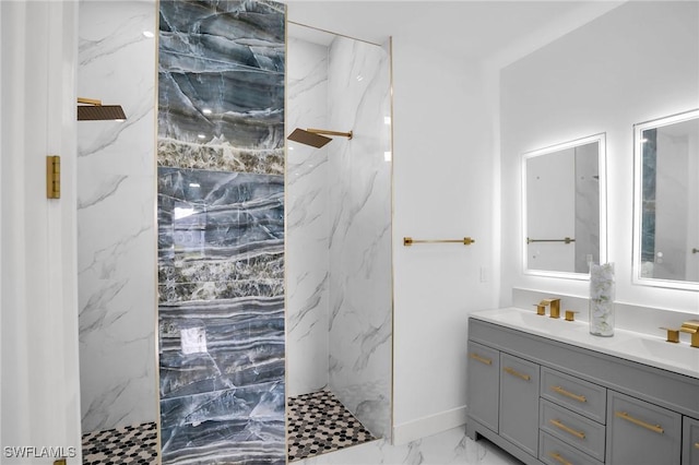 bathroom featuring a shower and vanity