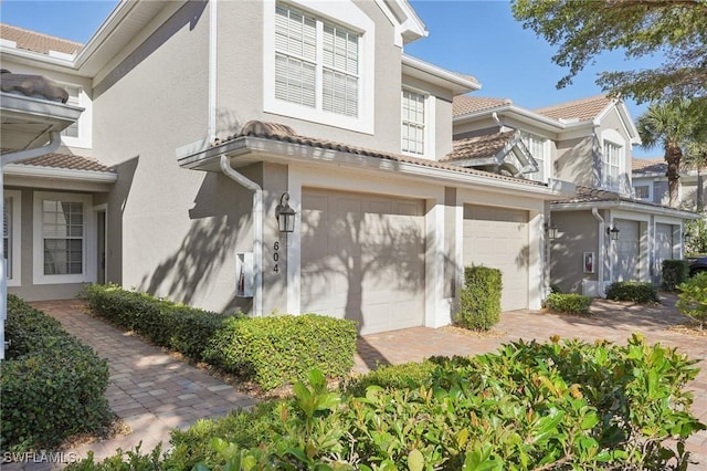 view of front of property with a garage