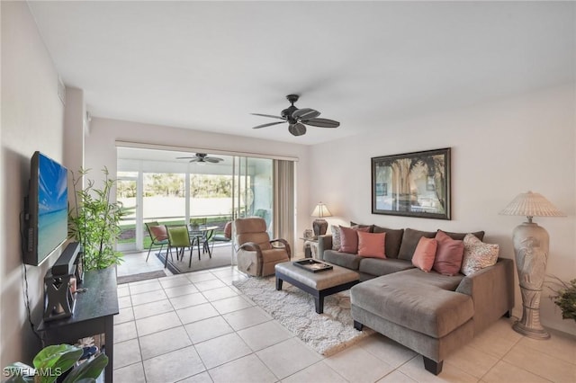 living room with ceiling fan and light tile patterned floors