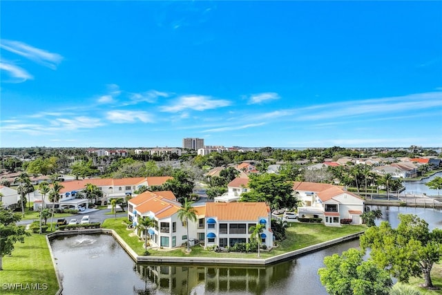 drone / aerial view with a water view