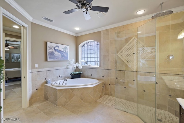 bathroom featuring sink, ornamental molding, tile walls, and plus walk in shower