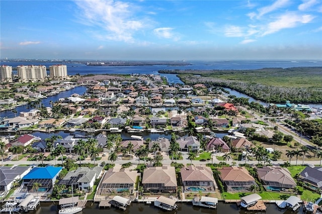 bird's eye view with a water view