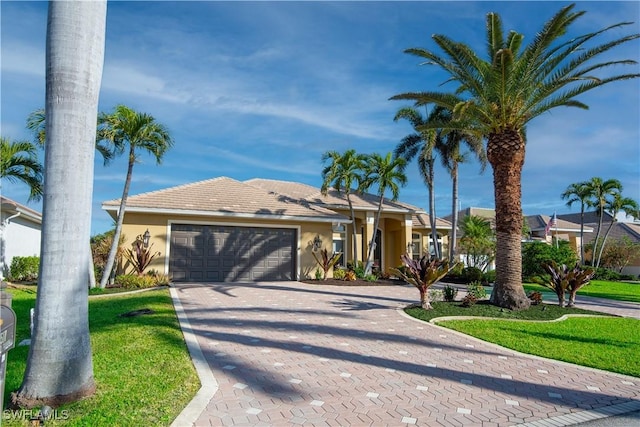 view of front of home with a garage