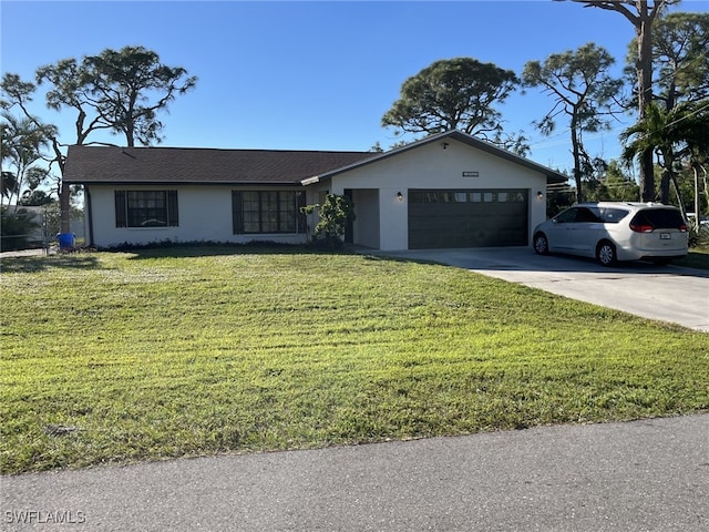 ranch-style home with a garage and a front yard