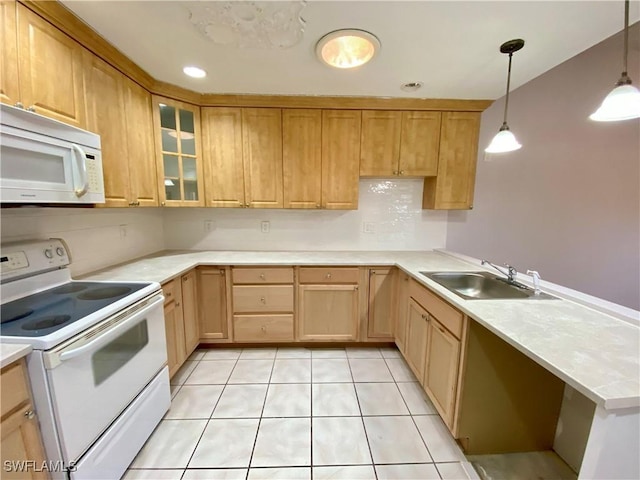 kitchen with sink, hanging light fixtures, white appliances, decorative backsplash, and light tile patterned flooring