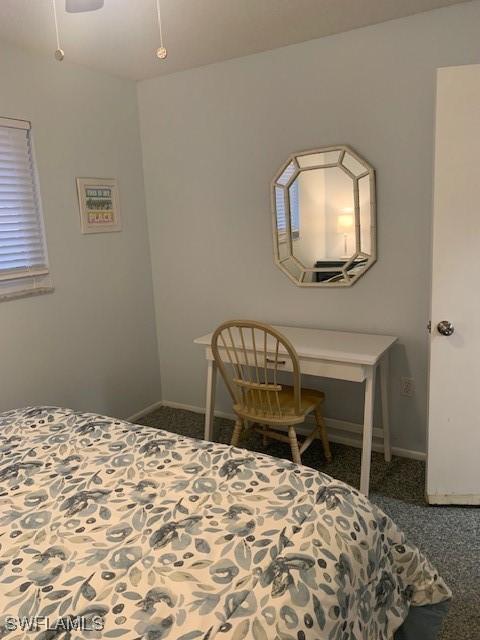 170 Turtle Lake Ct Unit 304, Naples, FL 34105 - bedroom with carpet and baseboards