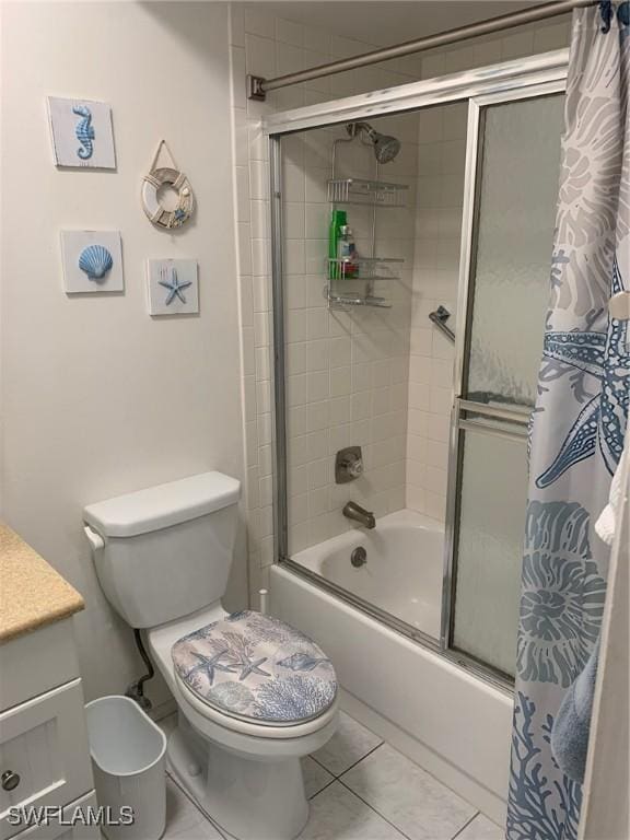 170 Turtle Lake Ct Unit 304, Naples, FL 34105 - bathroom featuring bath / shower combo with glass door, vanity, and tile patterned flooring