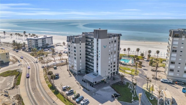 aerial view featuring a water view and a view of the beach