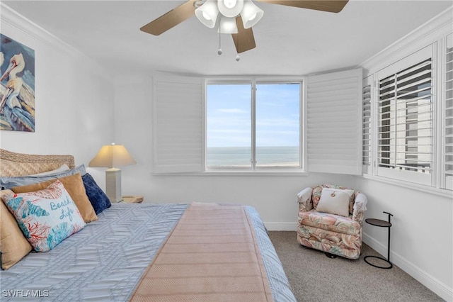 bedroom with carpet floors, ceiling fan, and baseboards