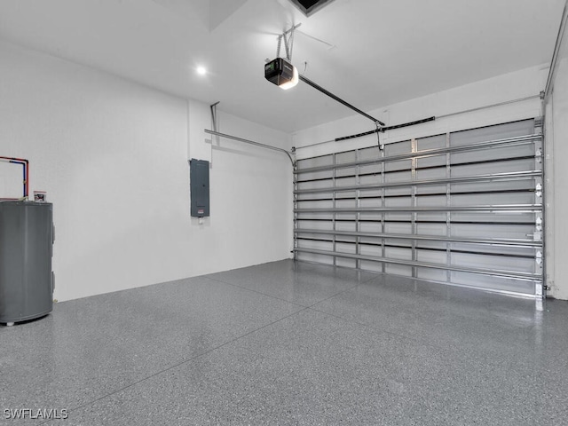 garage featuring electric panel, electric water heater, and a garage door opener