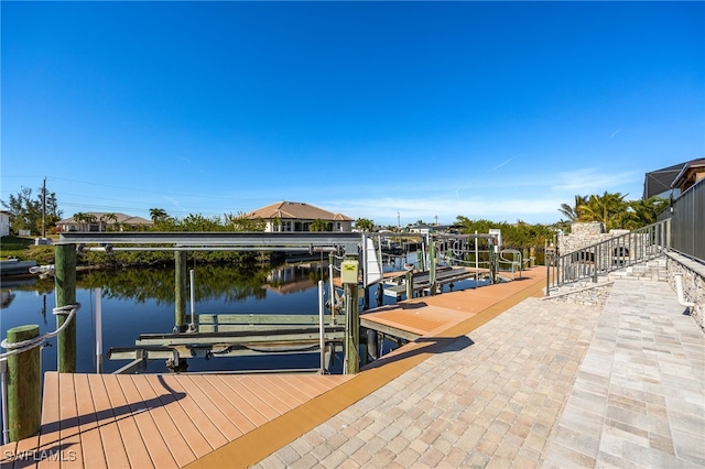 dock area with a water view