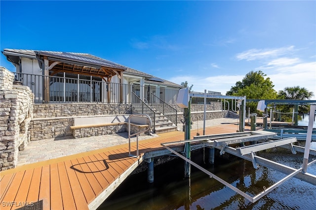 dock area with a water view