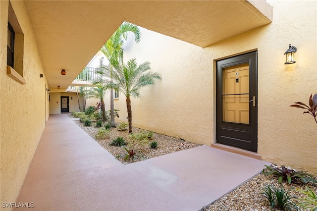 property entrance with a balcony