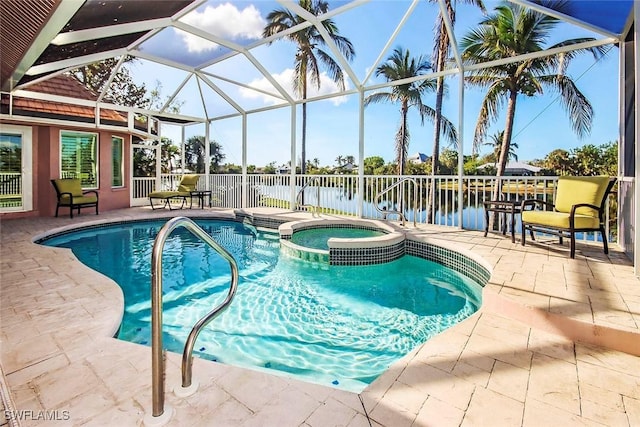 view of pool with an in ground hot tub, a patio, a water view, and a lanai