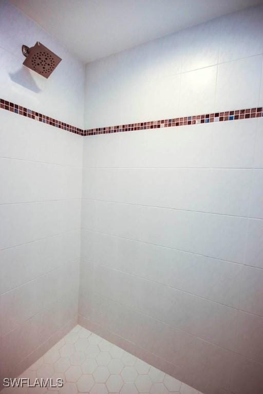 interior space with a tile shower