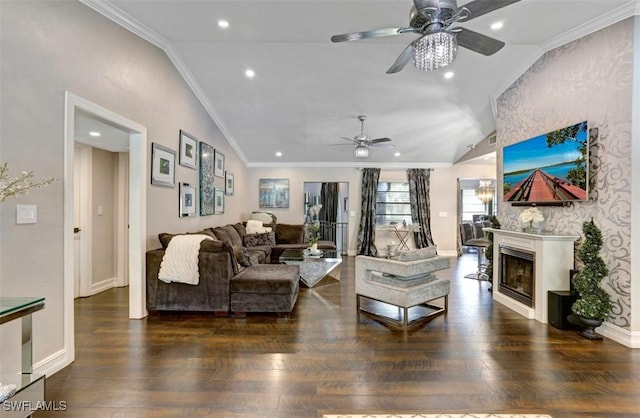 living room featuring crown molding, dark hardwood / wood-style flooring, and vaulted ceiling