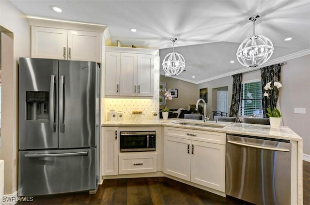 kitchen with kitchen peninsula, light stone countertops, sink, and stainless steel appliances