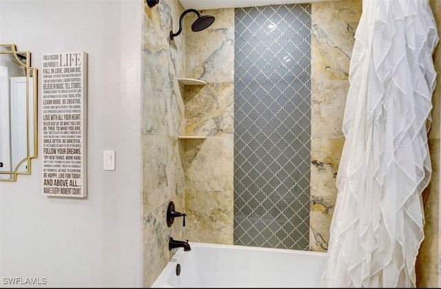 bathroom featuring shower / bathtub combination with curtain