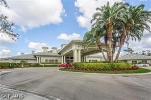 view of property featuring driveway