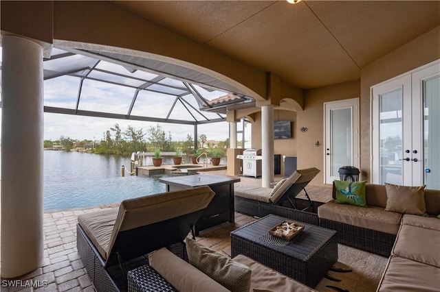 view of patio / terrace with glass enclosure, french doors, a water view, and an outdoor hangout area