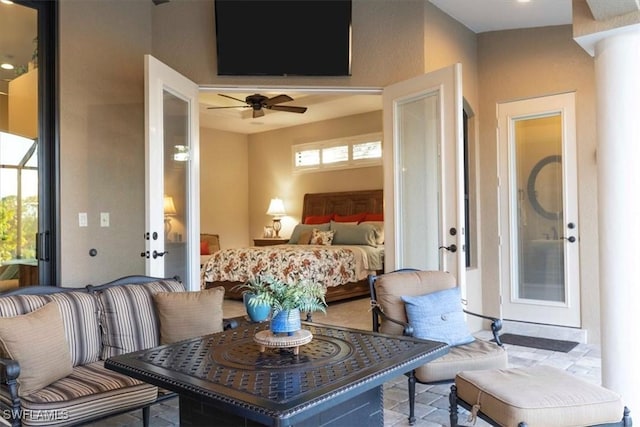 bedroom featuring french doors and multiple windows