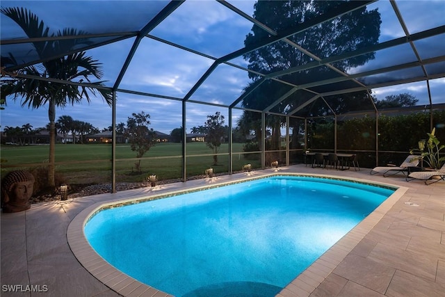 view of pool featuring a patio area and a lanai